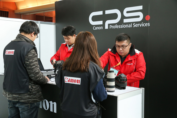 A Canon camera service booth provides support during a recent sporting event