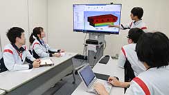 Image of a meeting at Canon Machinery Inc.