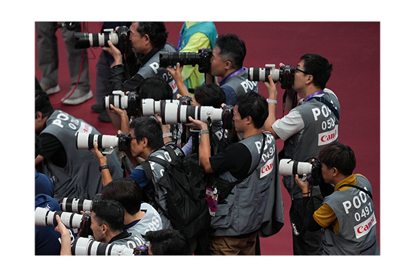 Photographers capturing definitive moments