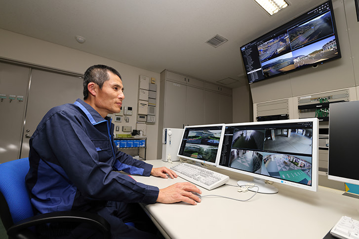 Scene of checking camera footage in the central control room