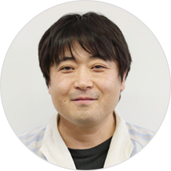 This is a portrait image of developer Masaki Suzui.