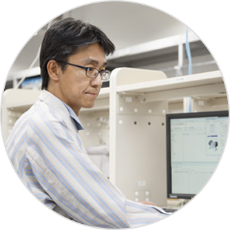 Portrait of a Canon engineer involved in large-format inkjet printer development.