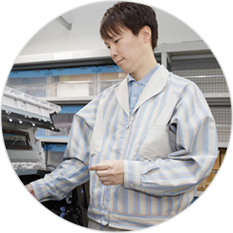 Portrait of a Canon engineer contributing to printer technology innovation.