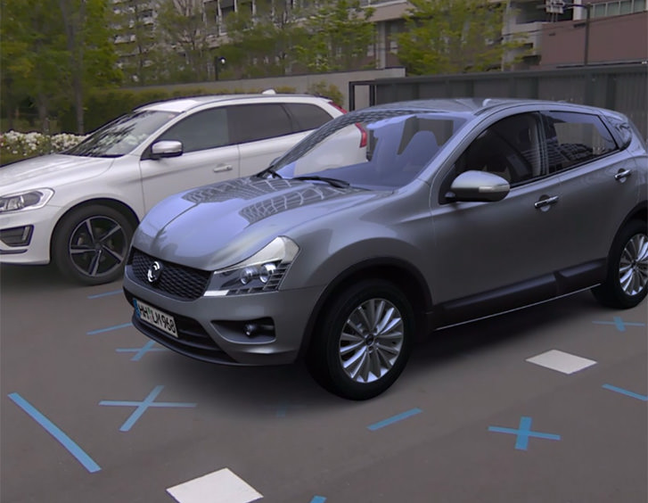 Conceptual image when using MR based on Spatial Feature Positioning Technology. (The car on the left is real, while the car on the right is 3D CG.)