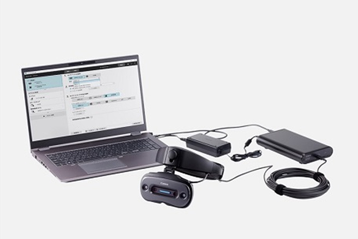 An image showing MREAL connected to a PC after being carried