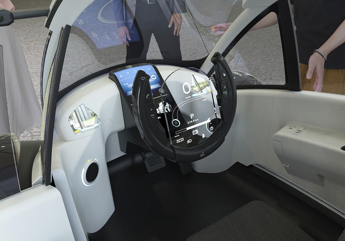 Image of a CG car seamlessly appearing in the real world through MREAL technology.