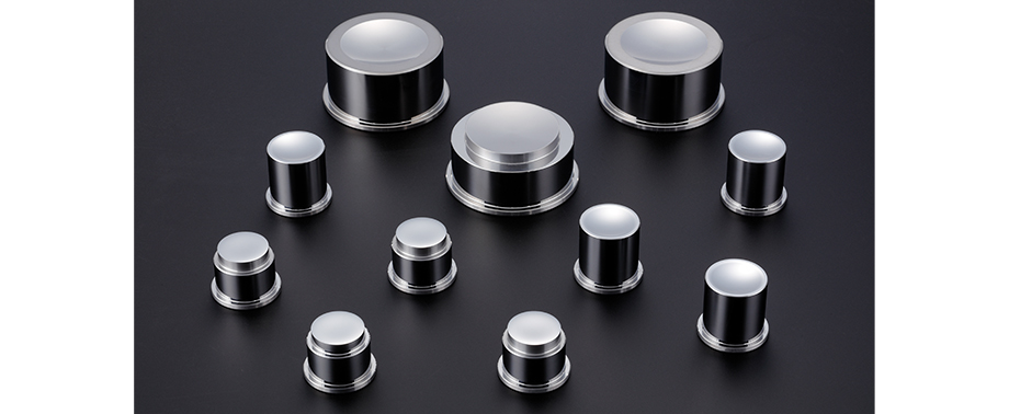 This image shows a glass mold used for high‑precision lens shaping.