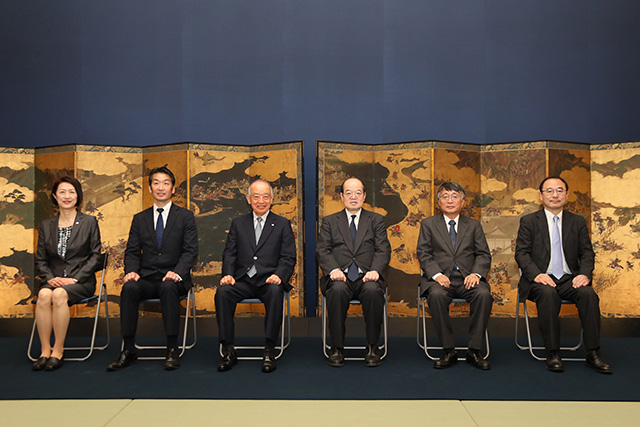 Representatives pose for a commemorative photo