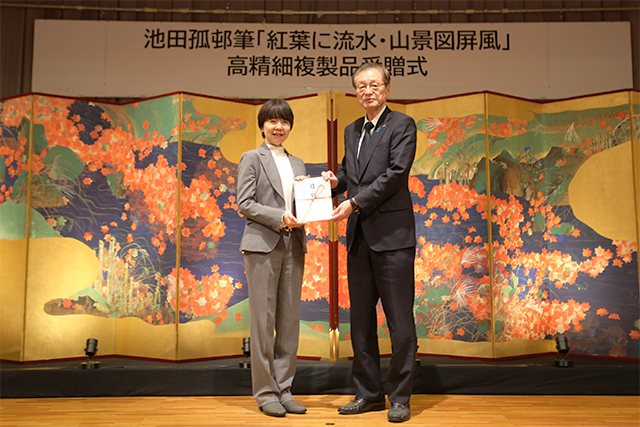 Presentation of certificate for donated work