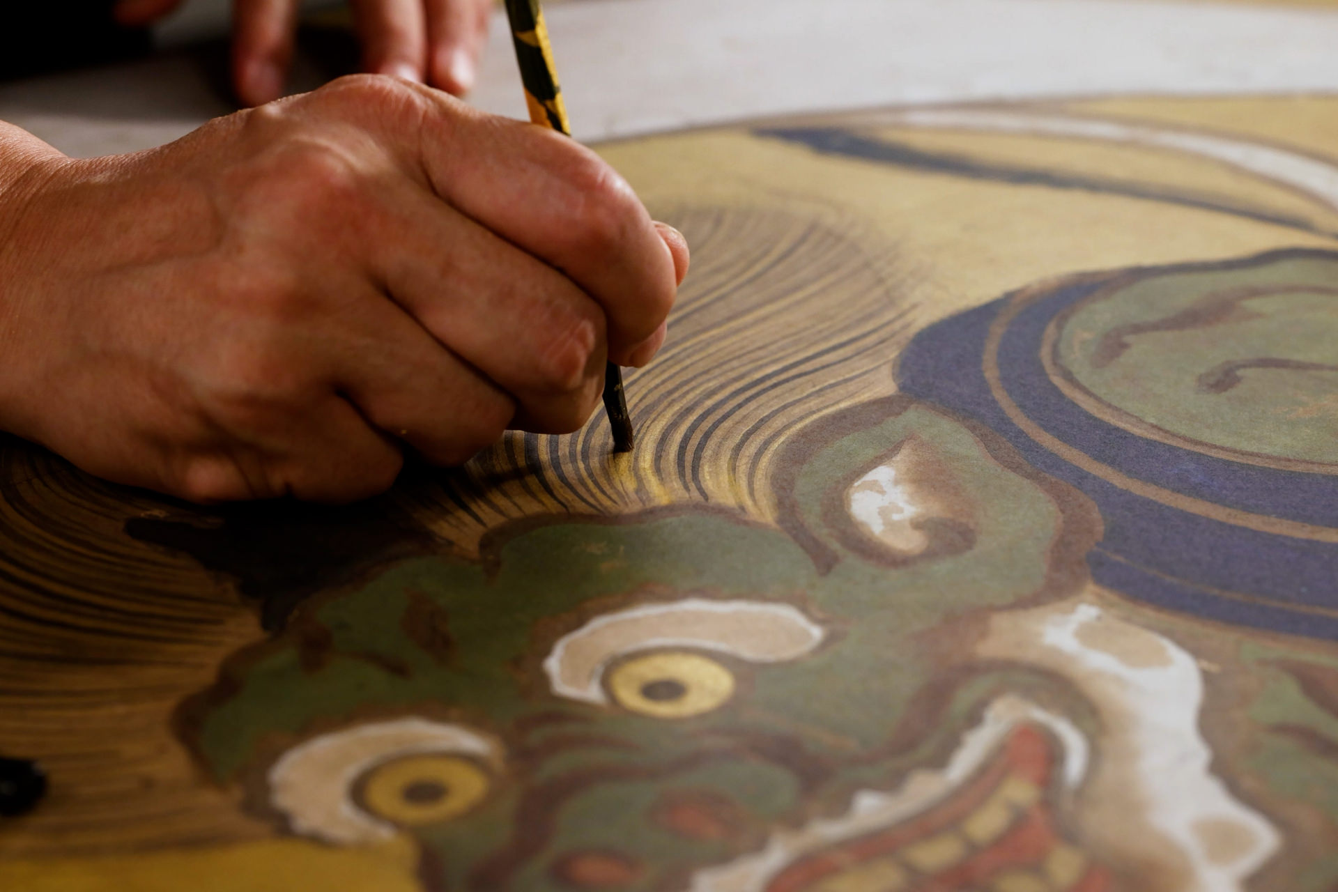 Gold leaf application scene