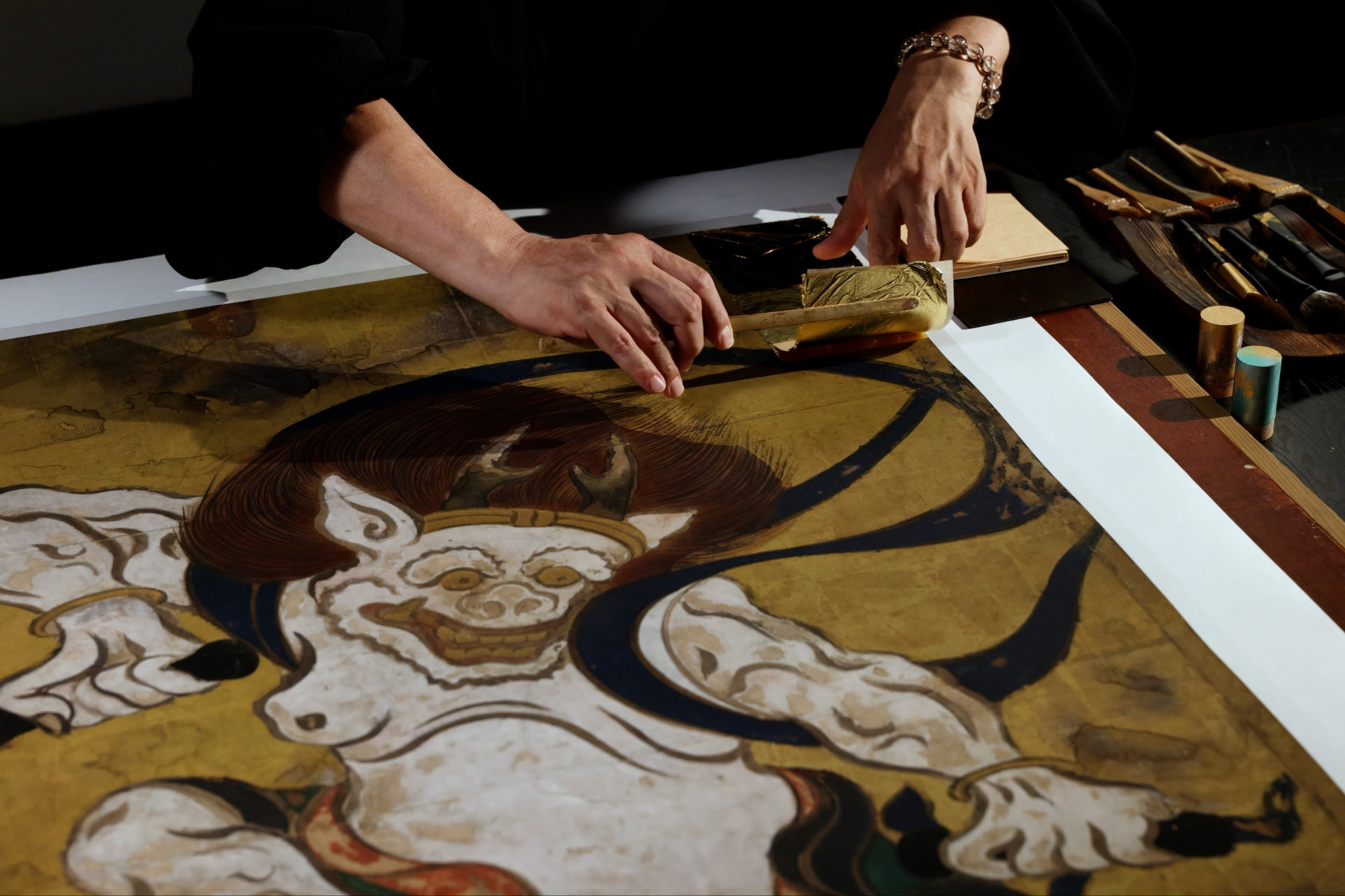 Gold leaf application scene