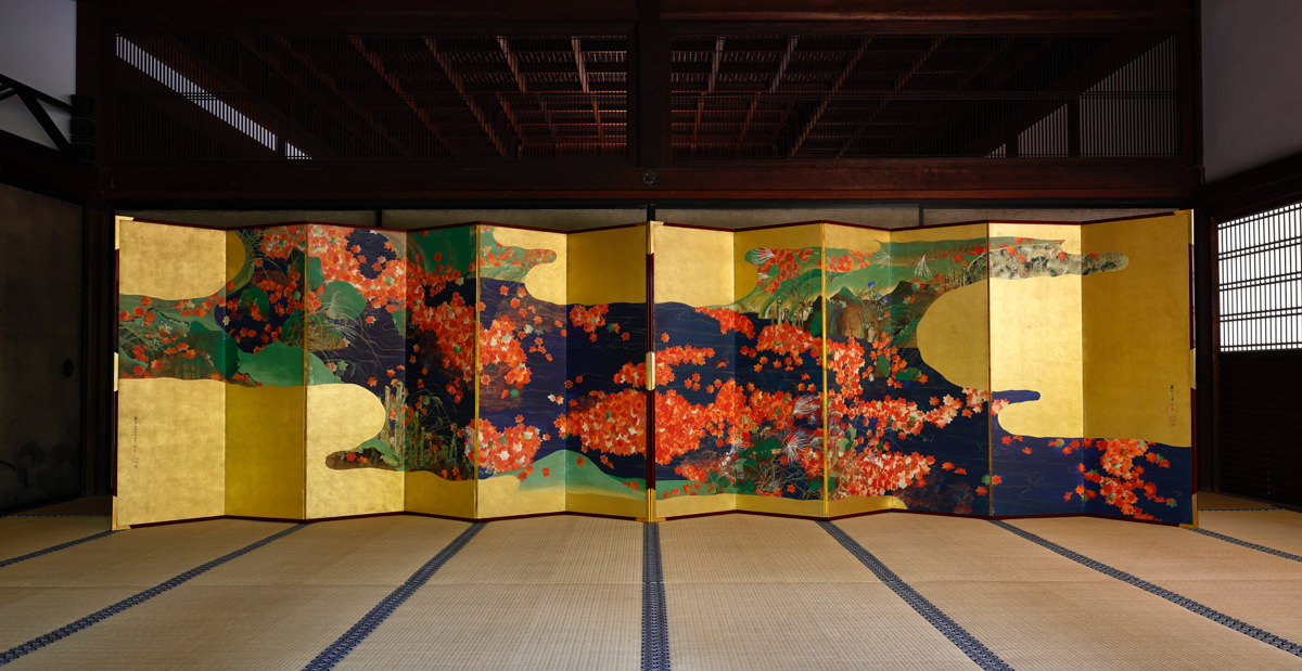 Maple leaves on a stream (front); mountain views (reverse)